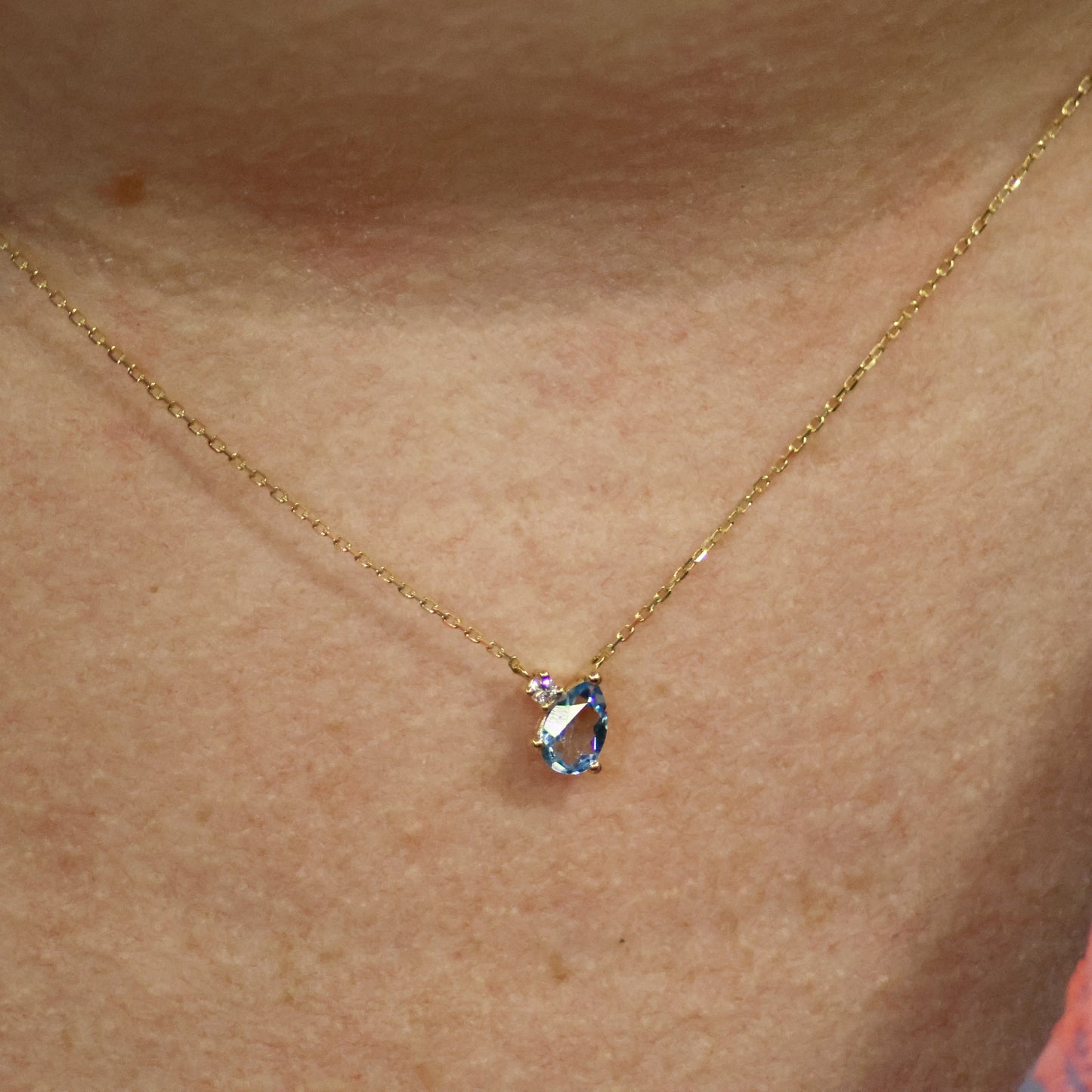 18kt geel gouden ketting met topaas en briljant 066488/TA