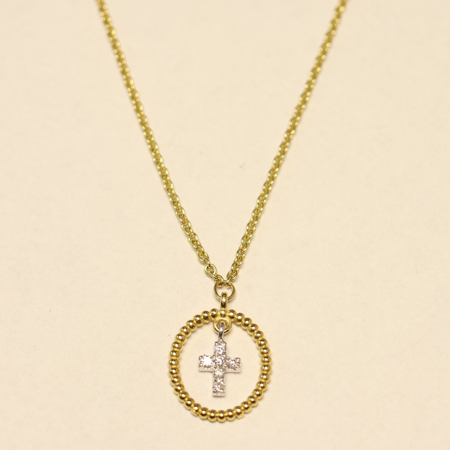 Ketting geel goud met kruisvormige hanger en briljant 067101