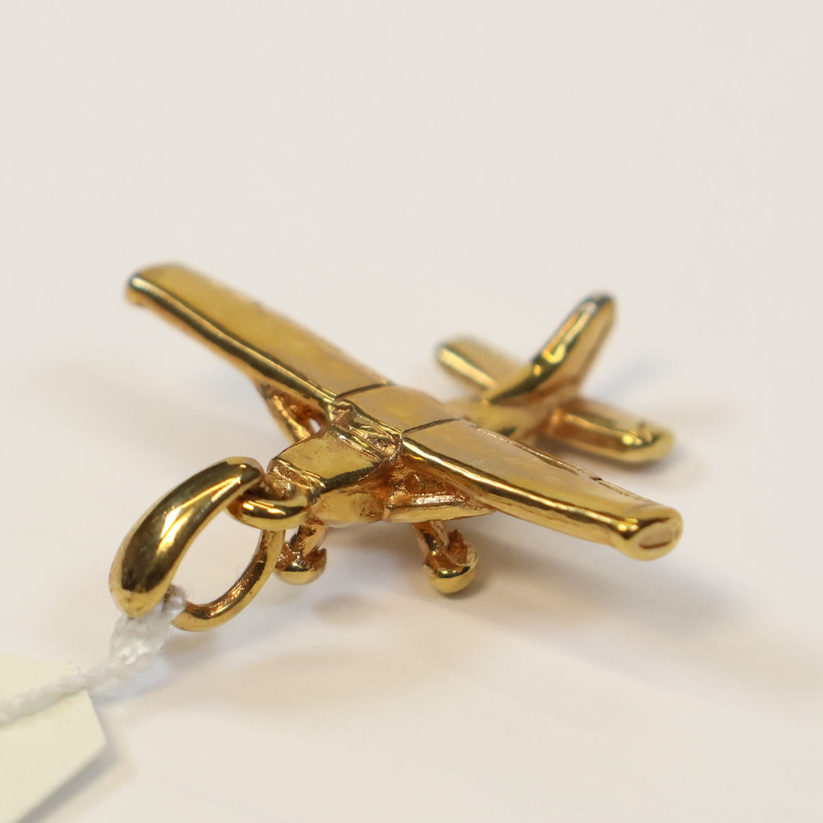 Plaqué vliegtuigje hanger