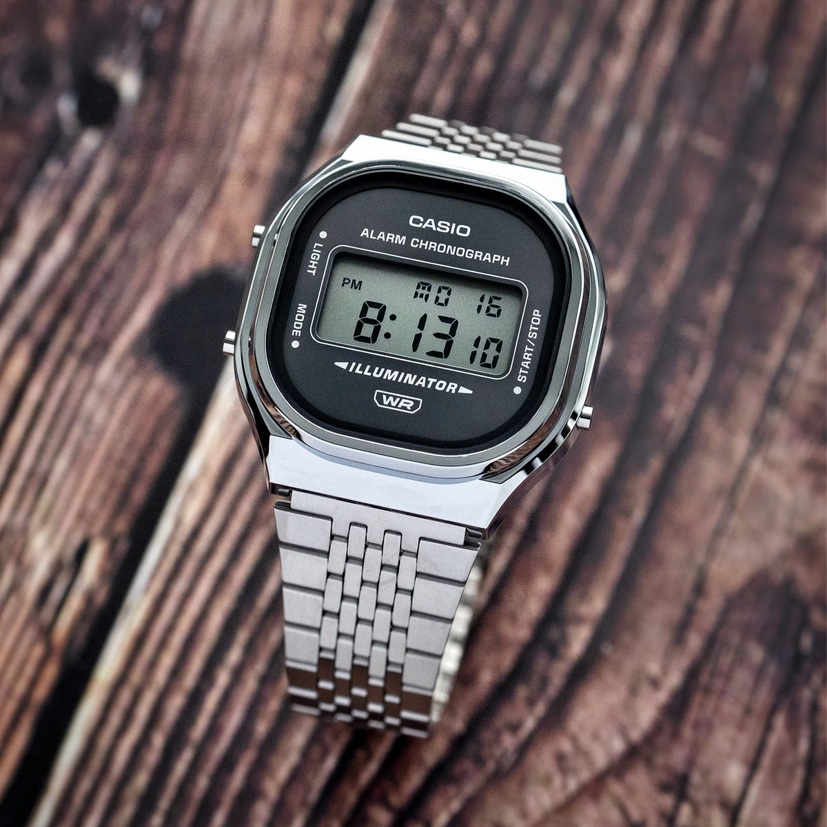 Casio horloge A140WE-8AEF vintage zilver afgeronde black dial