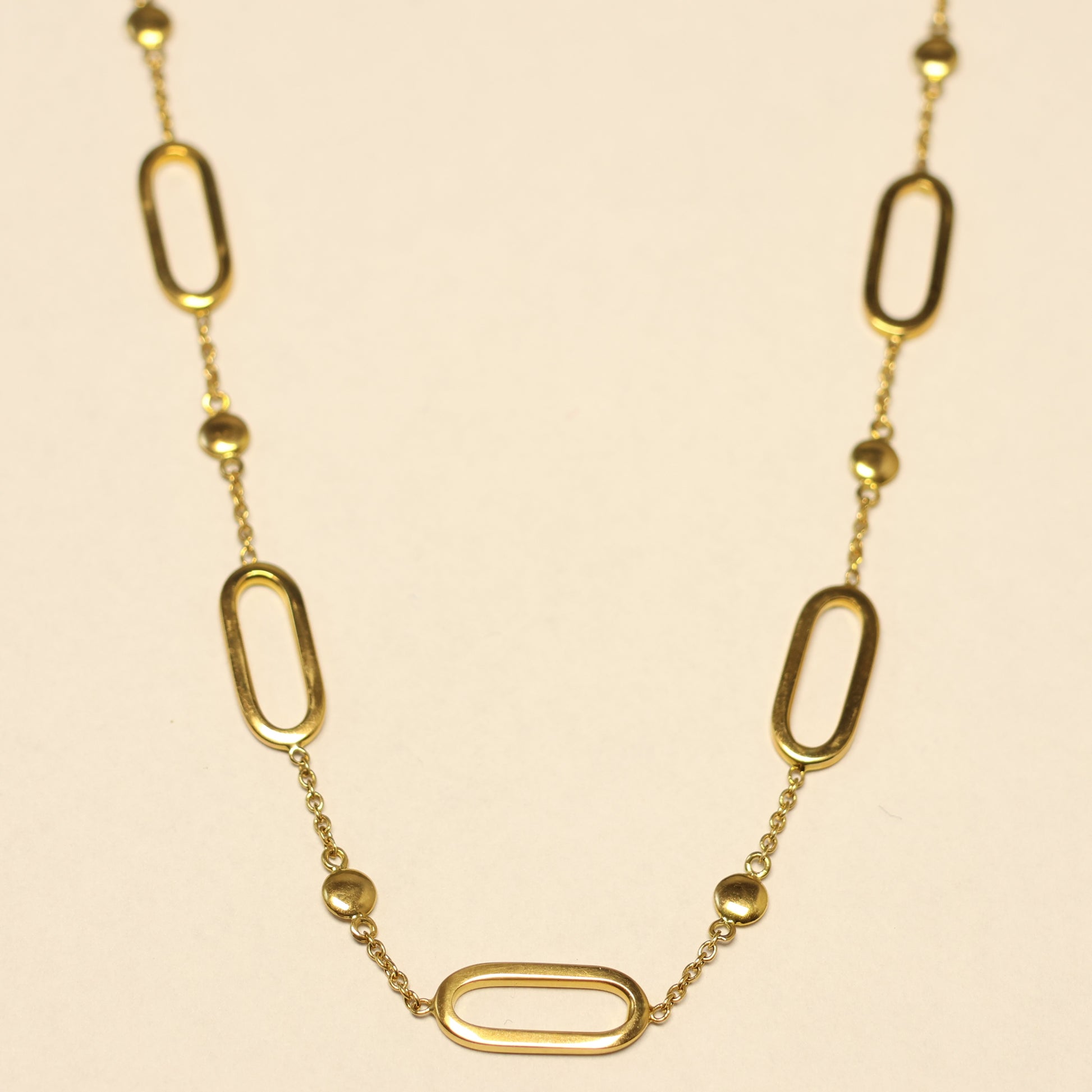Ketting 18 karaat geel goud ovalen ronde tussenstukken 058041/45
