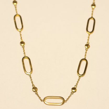 Ketting 18 karaat geel goud ovalen ronde tussenstukken 058041/45