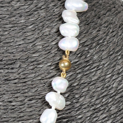 Parelketting 43cm 18 karaat gouden bolslot 8mm zoetwaterparel