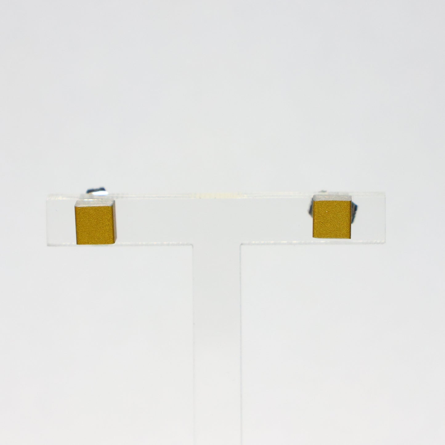 CLIC oorbellen gouden kubus