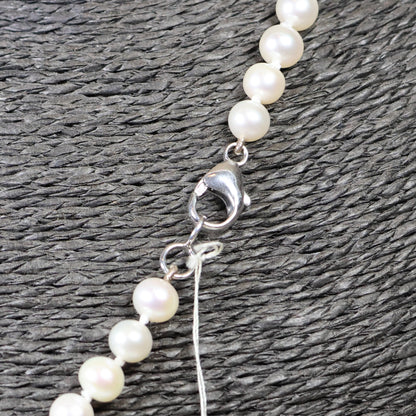 Parelketting 7mm zoetwaterparels rond zilveren slot 