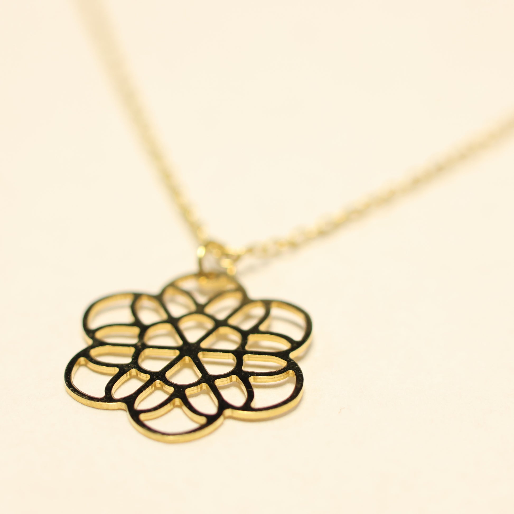 18kt geel gouden ketting met bloemvormige hanger 065669/42
