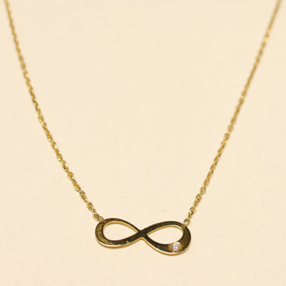 Ketting geel goud met infinity tussenstuk met briljant 056972A
