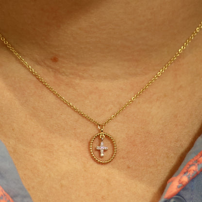 Ketting geel goud met kruisvormige hanger en briljant 067101