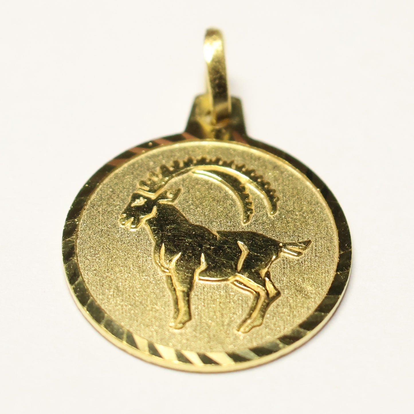 Tresor plaqué sterrenbeeld ronde hanger steenbok